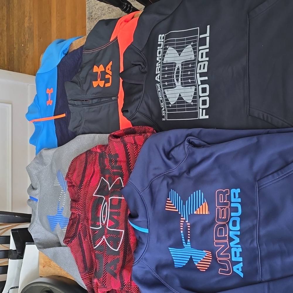 Lot of boys under armour hoodies.